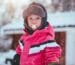 macro photo boy in pink full-zip jacket and black beanie